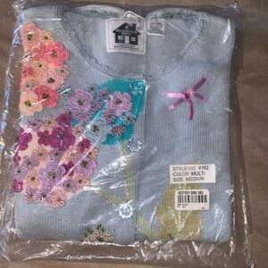 Vintage Storybook Knits cardigan featuring beaded floral and dragonfly